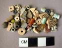 80 miscellaneous beads - ostrich egg shell, carnelian, faience and glass
