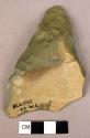 Portion of flaked and chipped chert blade.  3 1/2" x 2 1/2".  In bag marked: 20,