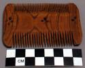 2 wooden combs; 3 3/4 x 2 1/4"
