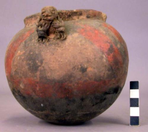 Pottery jar, human figure on sides