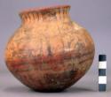 Pottery jar, base red, upper zone white with black ornamentation