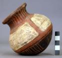 Pottery jar, base red, upper zone white with black ornamentation