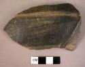 Black ware sherd - marked with one indented and one raised line