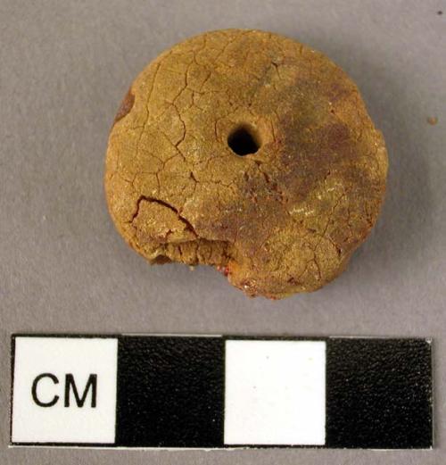 Amber pendant, disk-shaped