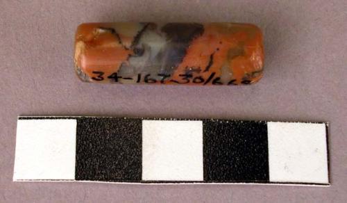 "Senorita"- tubular black and red stone bead-like ceremonial object