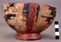 Decorated ring base earthenware bowl with watermarked pattern