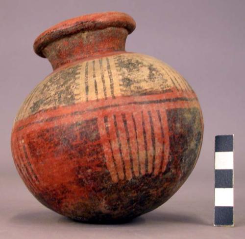 Pottery jar, base red, upper zone white with black ornamentation