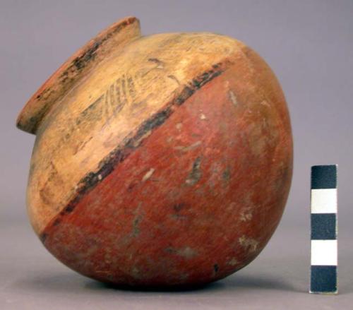 Pottery jar, base red, upper zone white with black ornamentation