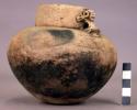 Ceramic jar, round bottom, constr. neck, 2 appl. effigy handles, burnt