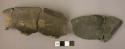 Sherds and sections of a ceramic vessel with protruding knobs on side as decorat
