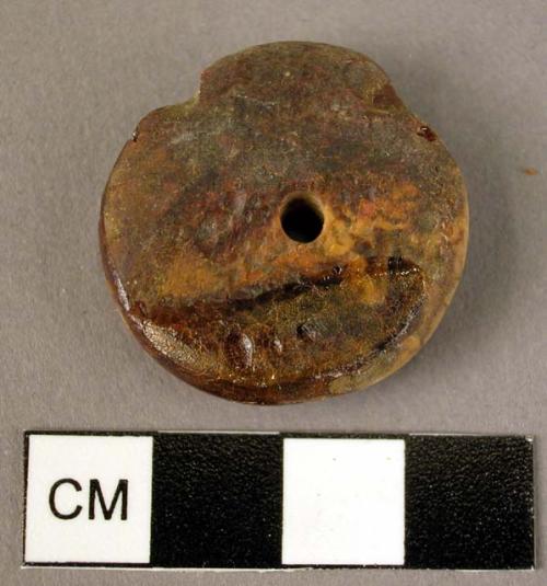 Amber pendant, disk-shaped