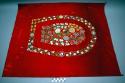 Pieces of moose hair embroidery on red broadcloth