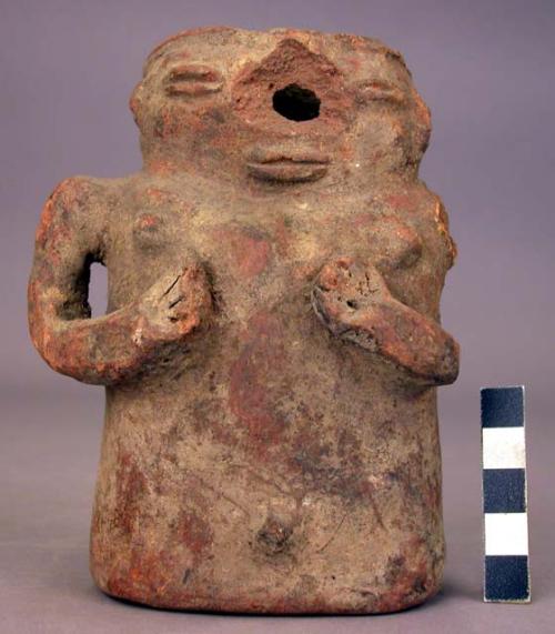 Terra cotta vase, grotesque human form