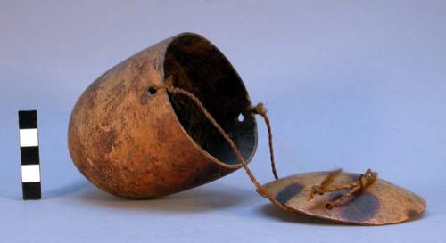 Small gourd container with attached lid - hardened substance inside