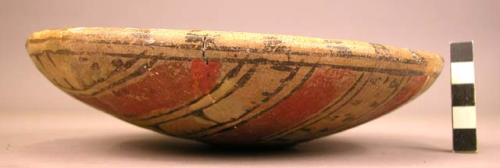 Shallow polychrome pottery vessel