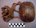 Knee rattle of turtle shell with burros' toe nails - used in rain dance