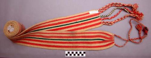 Woven wool belt, red stripes and one green stripe on white. 10 x 236 cm. minus