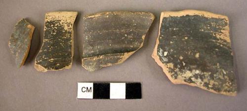 3 splayed rim sherds of pottery cups; 1 splayed sherd of pottery cup