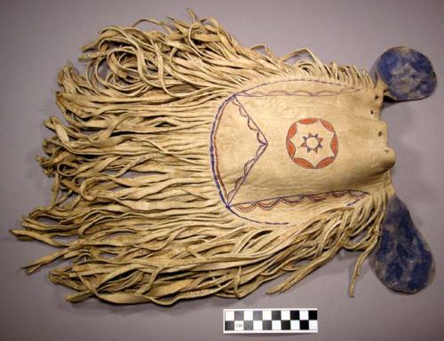 Leather bag with long, heavy fringe. Painted red and blue.