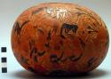 Elaborately carved and painted gourd (approx. 7" in diam.)