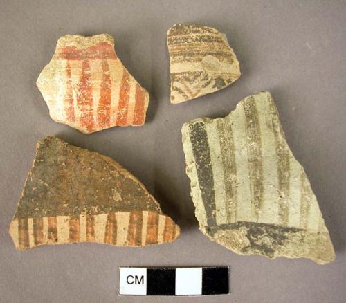 7 potsherds; pottery base fragment