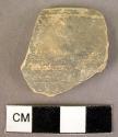 Black monochrome pottery rim fragment - Late Helladic III import