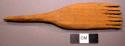 Comb, wood, pointed handle, 7 tines, flat