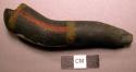Navajo hunting pipe of clay--black with yellow and red design. (male)