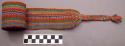 Woman's sash (pas) used to hold skirt in place; warp face cotton woven with a pu