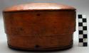 Box, oval, carved wood, seams stitched w/ bark, stained, highly polished