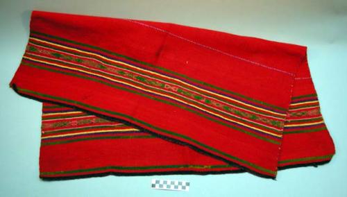 Woman's woolen carrying cloth - used in fiestas only; red background +