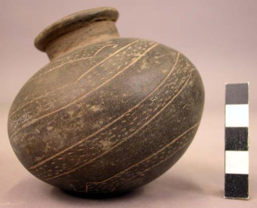 Vase, black with incised discs