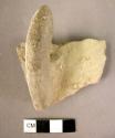 Triangular sectioned pottery handle - light slipped local ware, trace of black s