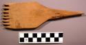 Navajo wooden weaving comb. Tapering handle. Wide body w/ eight tines. 19x5.9 cm