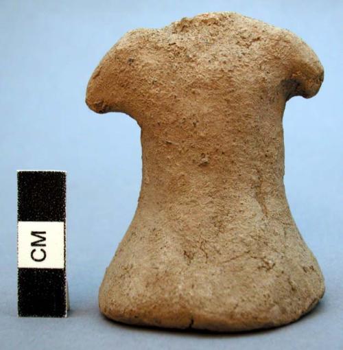 Unfired clay figurine depicting human (torso only)