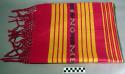 Apron pattern - red cotton plain weave decorated with yellow stripes of fancy tw