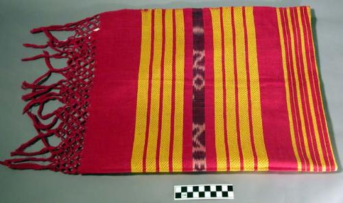 Apron pattern - red cotton plain weave decorated with yellow stripes of fancy tw