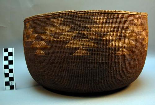 Twined cooking basket. Geometric designs connected into one zigzagging band