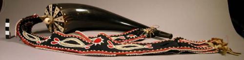 Horn and ivory flask with beaded strap