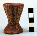 Small pottery cup with base