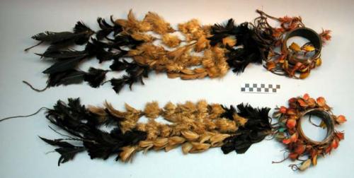 Pair of feather arm ornaments