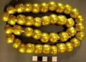 Necklace of 113 gold beads-Peabody Museum 1/2; Contes 1/2