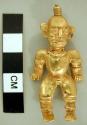 Human figure (male) in gold with topknot>  Loop on back.
