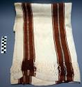 Woman's head cloth - everyday use, less common type; broad brown stripes on whit