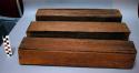 Three wooden rectangular rattles