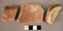 3 potsherds - red glaze slip monochrome