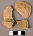 8 potsherds; 3 shoulder sherds; 2 base fragments; 1 handle fragment - unslipped