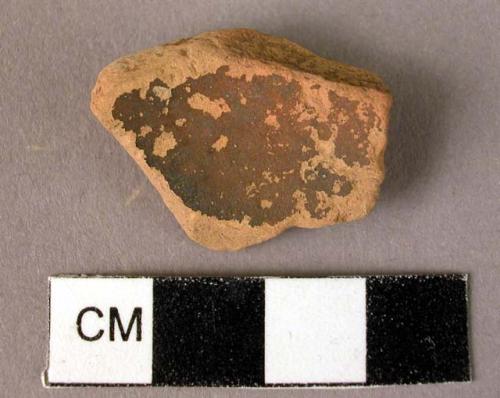 Pottery base fragment - dark red glaze on interior