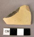 Pottery cylix or goblet fragment - burnished, probably naturalistic design fragm
