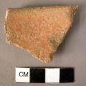 Potsherd - Red slipped and burnished bowl rim, surface worn, construction exteri